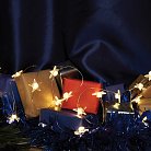 Светодиодная гирлянда линейная Звездочки на проволоке, 2700К, с питанием от батареек, прозрачный шнур Feron 51445CL589