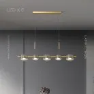 Реечный, рядный светильник NICOLETTA D LONG 5 ламп. Цвет Латунь Lampatron nicoletta-d-long-5-brass 7779-21917